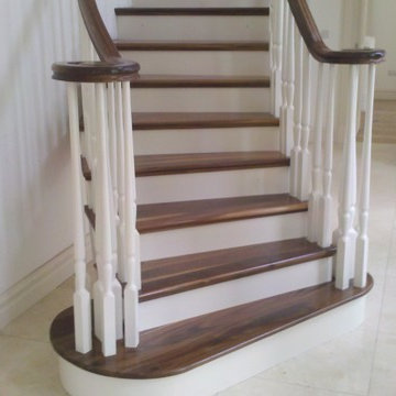 Curved Wallnut and painted continuous handrail