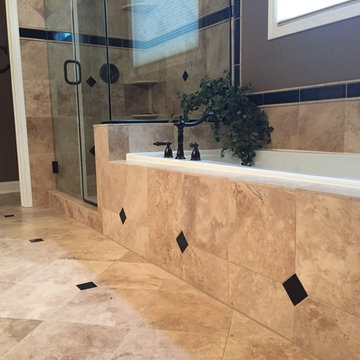 Custom Travertine Bathroom with Black Galaxy Accents