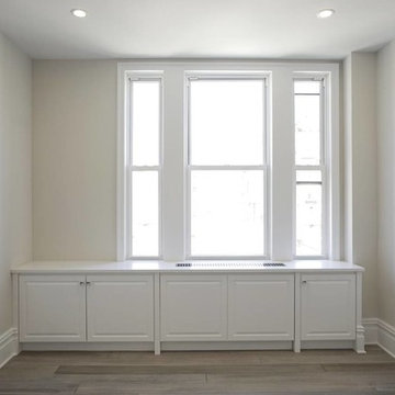 Bedroom with custom PTAC covers