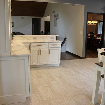 Rustic Alder Gray Stained Kitchen with White Hutch and Island