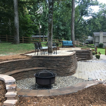 Multi-Level Paver Patio with Staircase and Seating