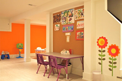Transitional kids' playroom in New York with multi-coloured walls.