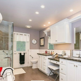 Mid-sized elegant master beige tile, brown tile and matchstick tile cement tile floor and brown floor bathroom photo in Orange County with shaker cabinets, white cabinets, a two-piece toilet, purple walls, an undermount sink, granite countertops and a hinged shower door
