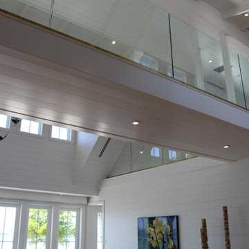 Glass Balustrade with Aluminum Base Rail Finished with Satin Brass Cladding