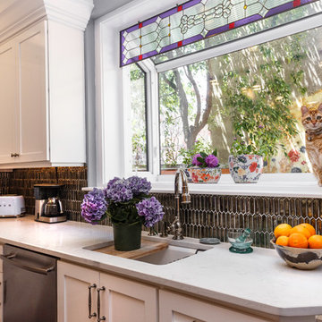 Transitional White Kitchen Remodel | Glass Display Cabinets & Custom Island