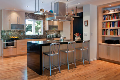 Kitchen - eclectic kitchen idea in Denver with stainless steel appliances