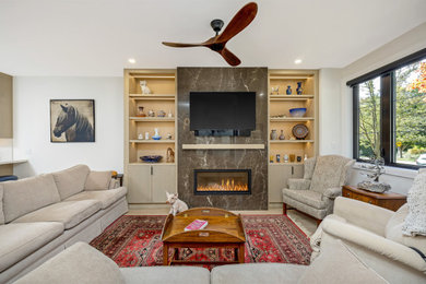 Example of a minimalist family room design in Toronto