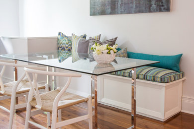 Inspiration for a mid-sized contemporary medium tone wood floor kitchen/dining room combo remodel in Toronto