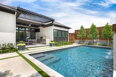 Mid-sized minimalist pool photo in Dallas