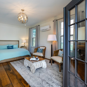 Cozy Bedroom with Seating Area and French Door Entry