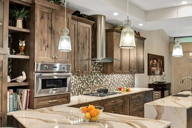 Inspiration for a large contemporary galley porcelain tile and beige floor eat-in kitchen remodel in Los Angeles with a farmhouse sink, flat-panel cabinets, medium tone wood cabinets, quartzite countertops, metallic backsplash, mosaic tile backsplash, stainless steel appliances, an island and beige countertops