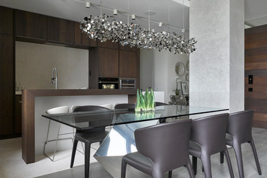 Inspiration for a contemporary kitchen/dining combo in Moscow with light hardwood floors.