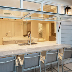 Flip Out Window w/fixed transom above (photo by shelmoskphotography) - Windows