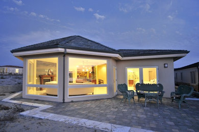 Example of a minimalist exterior home design in Other