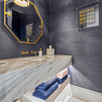 Full Bath with Floating Marble Vanity and Gold Accents