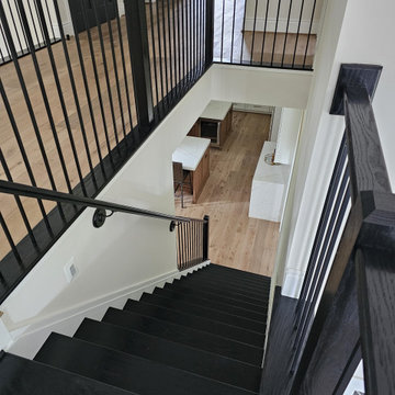 Project #130 | Curved Staircase with Wraparound Balcony