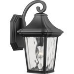 Progress Lighting - Marquette Collection 1-Light Large Wall Lantern with DURASHIELD - This wall lantern is a go-to choice when incorporating classic silhouettes with a farmhouse flair into your home decor vision. The traditional frame is constructed with non-metallic, corrosion-resistant composite polymer in a classic black finish. A beautiful water glass shade adds charming character to the timeless design. DURASHIELD by Progress Lighting is built to last. Constructed from a composite material with UV protection, DURASHIELD holds up even in the harshest weather conditions. This high-performance finish has a 5-year warranty and is resistant to rust, corrosion, and fading.