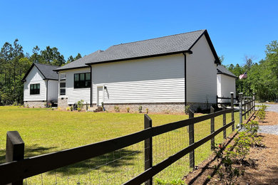 Cottage exterior home idea in Other