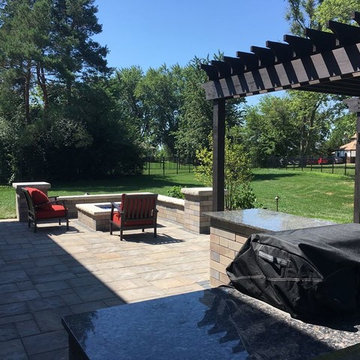 Unilock Beacon Hill Paver Patio, gas fire pit, granite counter top and Pergola