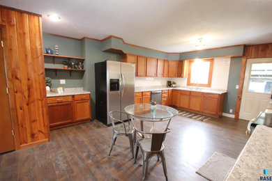 Dining room - cottage dining room idea in Other