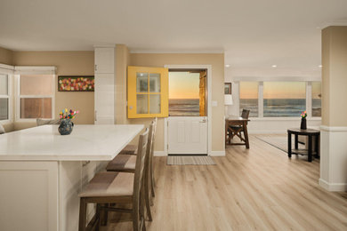 Photo of a beach style home design in San Diego.