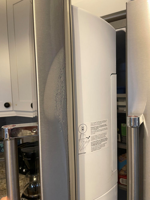 Condensation on inside of freezer door