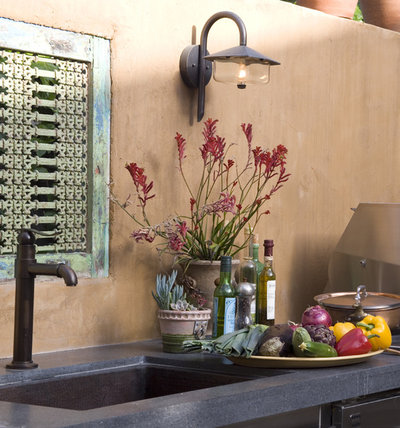 Eclectic Patio by Sandy Koepke