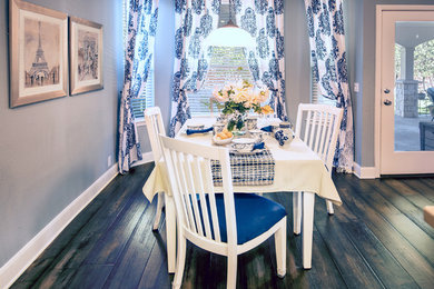 Mid-sized elegant dark wood floor great room photo in Austin with blue walls