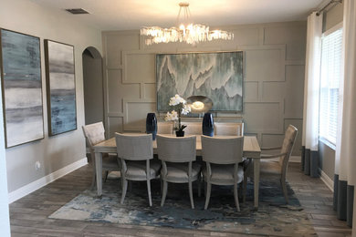 Kitchen/dining room combo - coastal porcelain tile, gray floor and wainscoting kitchen/dining room combo idea in Tampa with gray walls