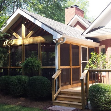 Multiple Gable Roof Lines Bring Together this New Porch and the Existing Home