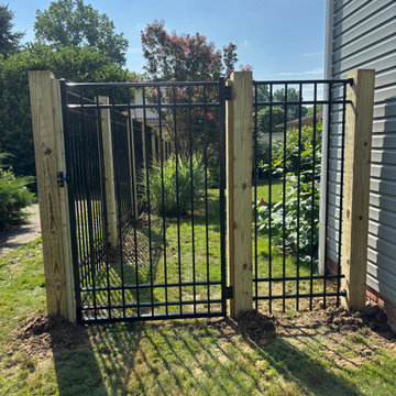6' Ornamental Aluminum Black Fence installed on 6x6 treated pine posts