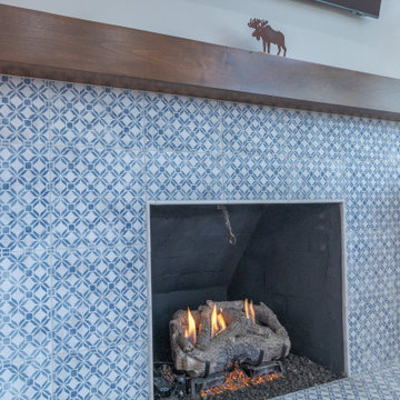 Porcelain Island Kitchen Remodel with Custom Built-Ins + Fireplace Feature