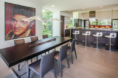 Trendy kitchen/dining room combo photo in Cincinnati with white walls and no fireplace