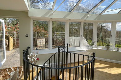This is an example of a medium sized conservatory in Hertfordshire.