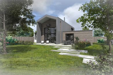 Inspiration pour une grande façade de maison grise design à un étage avec un toit gris.