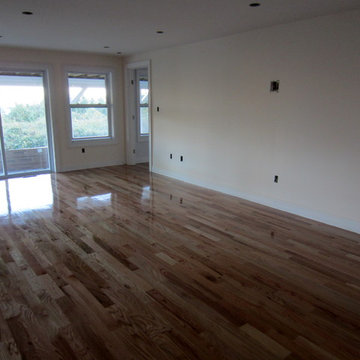 MONTAUK NEW CONSTRUCTION: 3 1/4" #1 RED OAK INSTALLED AND FINISHED NATURAL!
