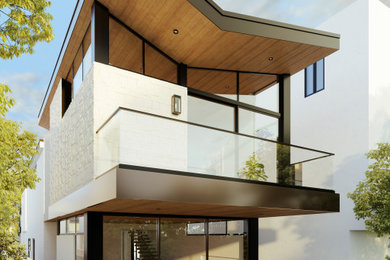 Example of a mid-sized trendy white two-story stucco house exterior design in Los Angeles with a butterfly roof, a metal roof and a brown roof