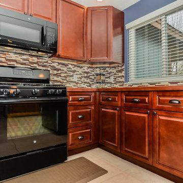 Cherry Raised Panel Kitchen Cabinets