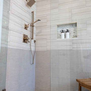 Spa Like Primary Bathroom Remodel with Warm Wood & Brass Details