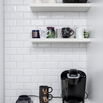 Open Shelving with White Subway Tile Wall