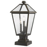 Z-Lite - Talbot 3 Light Outdoor Pier Mounted Fixture in Rubbed Bronze - Illuminate an exterior front or back walkway with a classic fixture reflecting a charming village theme. Made from Rubbed Bronze metal and seedy glass panels this three-light outdoor pier mounted fixture delivers a charming upgrade with industrial-inspired attitude and a layered silhouette that's perfect for lower-level gardens and walkways.andnbsp