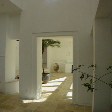 Gate to living room,entry to kitchen at left
