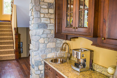Example of a mountain style kitchen design in Detroit