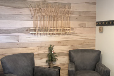 Example of a small mountain style home design design in Detroit