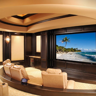 Tuscan beige floor home theater photo in Cleveland with a projector screen