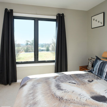 Attractive Bedroom with New Black Windows - Renewal by Andersen Georgia