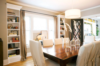 Example of a classic dining room design in Wichita with gray walls