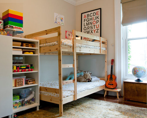 Eclectic Kids Edmonton Eclectic gender-neutral kids' room idea in New York with beige walls and dark