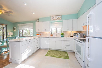 Photo of a beach style kitchen in Tampa.