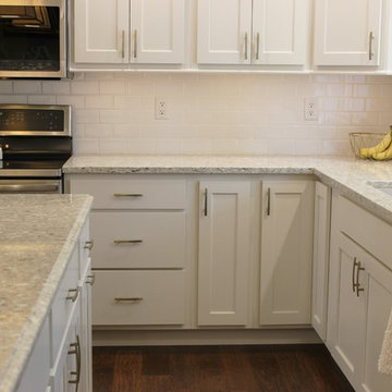 Davenport, IA- White Painted Kitchen With Gold Accents and Large Island